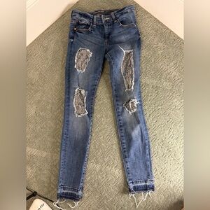 Girls skinny jeans. Ripped sequin jeans.